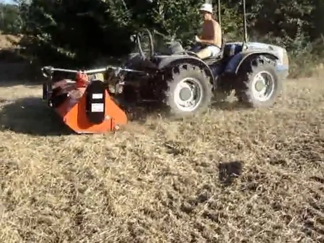 Muratori MT40 flail mower clearing orchard prunings