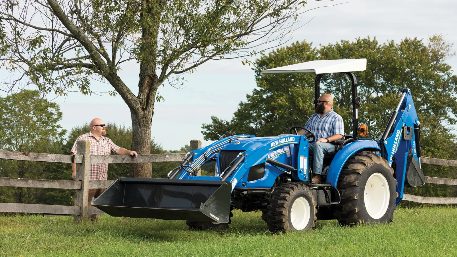 Representative New Holland Boomer compact tractor with a loader and backhoe