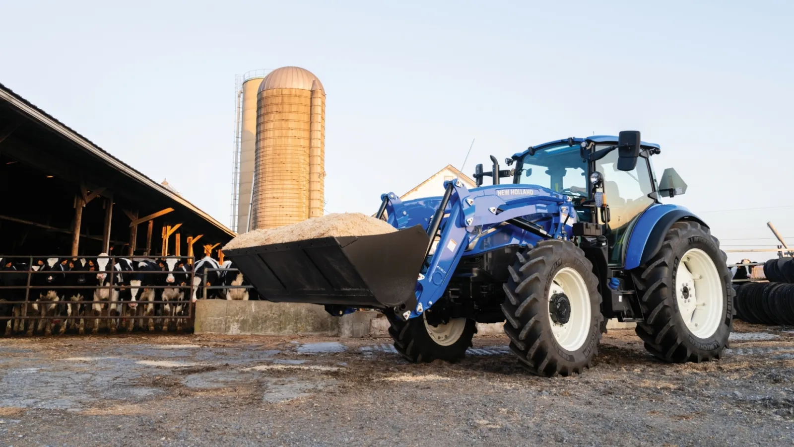 New Holland PowerStar utility tractor at work on a farm