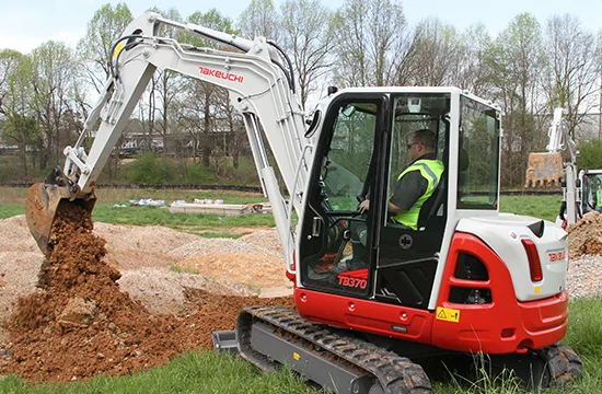 Takeuchi construction equipment at work